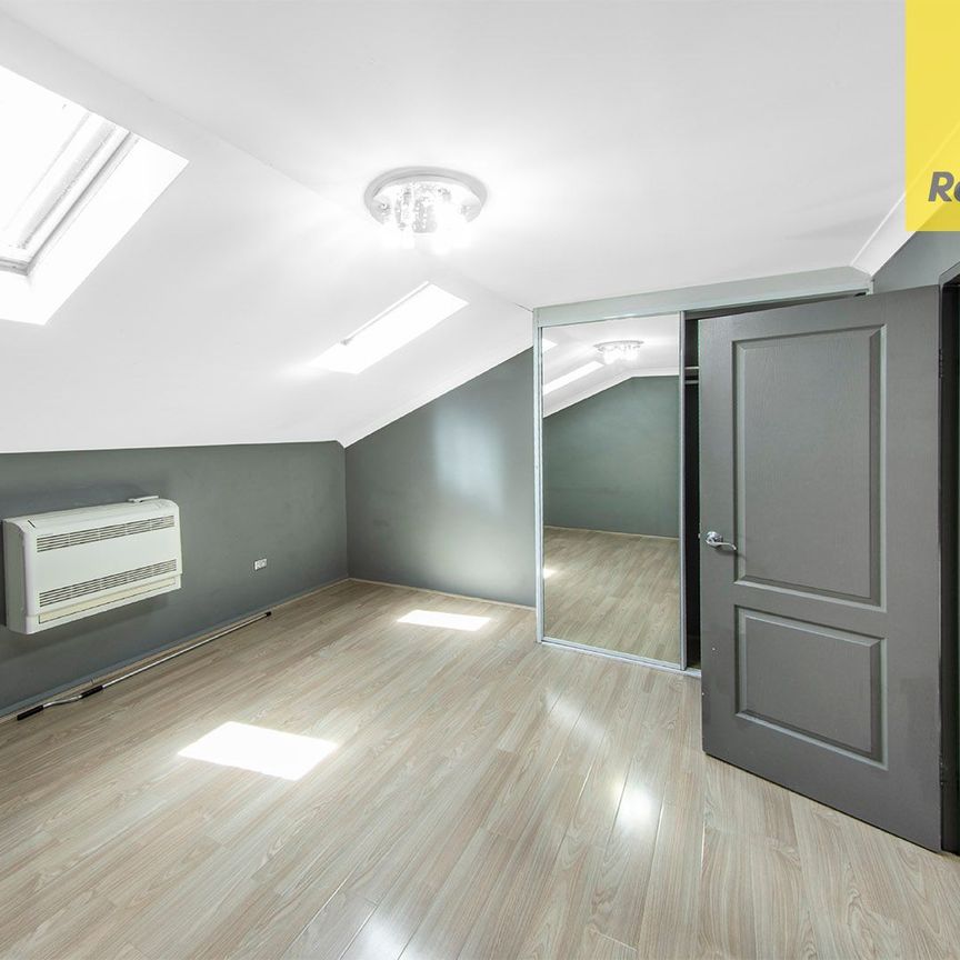 UNIQUE TWO-STOREY LIVING AT ITS BEST - Photo 1