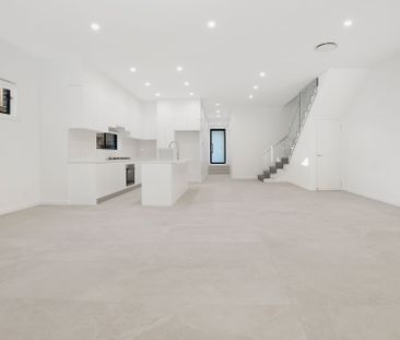 Near new, spacious four bedroom duplex backing onto a reserve - Photo 3