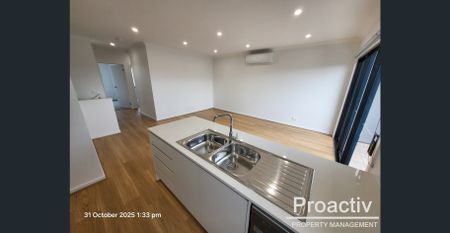 Brand New & Brilliantly Designed | 3-Bedroom Townhome in Fraser Rise - Photo 5