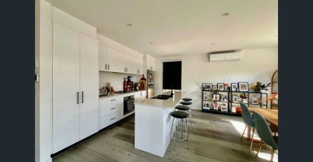 Modern Comfort with Double Garage & Entertaining Deck - Photo 5