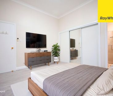 FRESHLY UPDATED FOUR-BEDROOM FAMILY HOME IN A CONVENIENT LOCATION - Photo 2