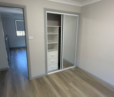 Spacious Five-Bedroom Family Home in a Convenient Location - Photo 3