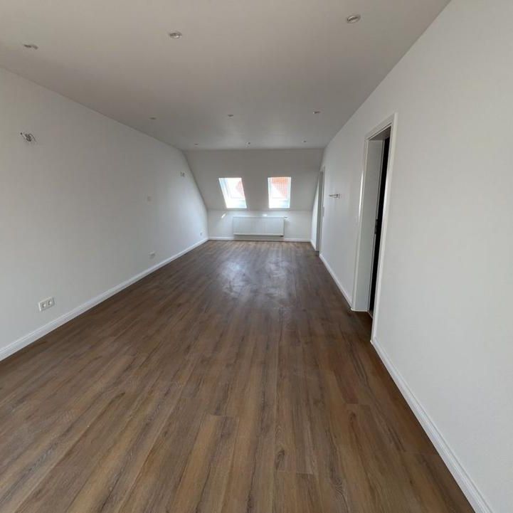 Erstbezug nach Sanierung: Charmante Dachgeschosswohnung - Foto 1