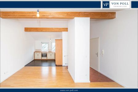 Vermietung: Helle Dachgeschosswohnung mit Balkon und Wohlfühlambiente - Photo 2