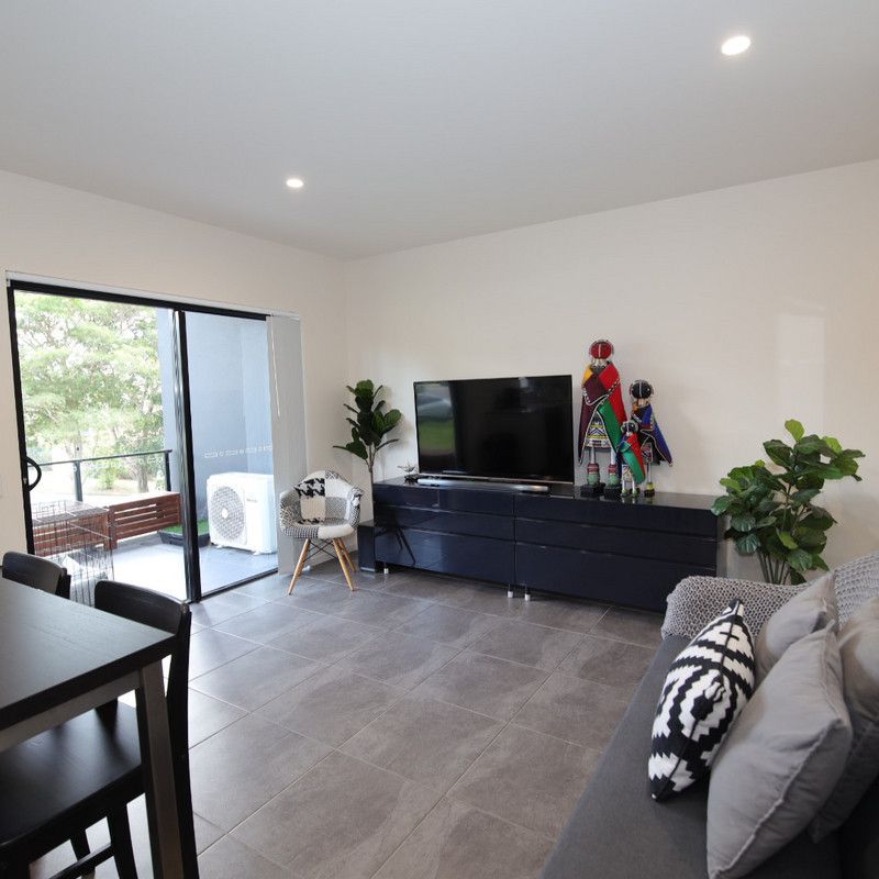 Modern Apartment With Location Appeal - Photo 1