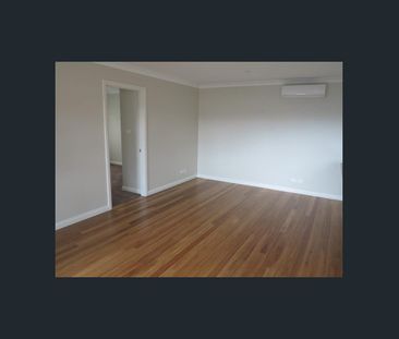 Stylish Two-Bedroom Living in a Convenient Location - Photo 6