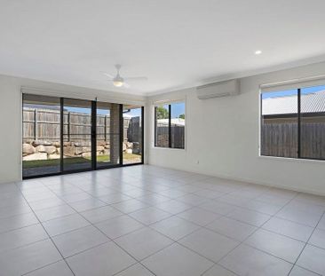 This family home that is sure to impress! - Photo 1