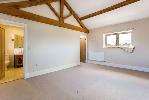 An exquisite four bedroom, four bathroom barn conversion with South facing garden, beautifully modernised and finished to a superb standard - Photo 1