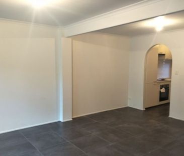 Renovated Townhouse In Convenient Location! - Photo 1