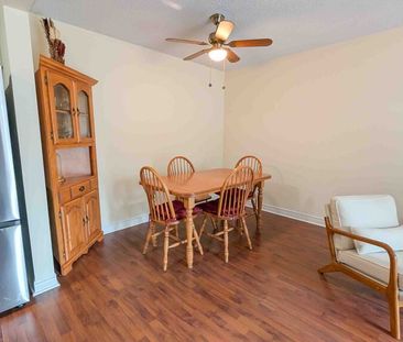 Modern Main Floor 2 Bedroom Apartment with Patio Space! - Photo 1
