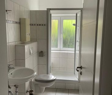 Sehr schöne Erdgeschosswohnung mit Balkon in zentrumsnaher Lage - Photo 5