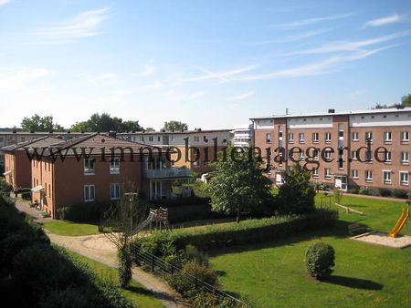 Ruhiges Gartenhaus im Zentrum einer Wohnanlage - Sonnige Endetage mit großen L-Balkon im 1.OG - Photo 4