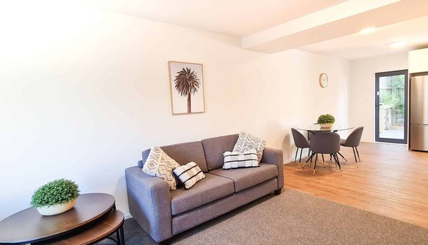 Modern Townhouse in Central City with Garage - Photo 1