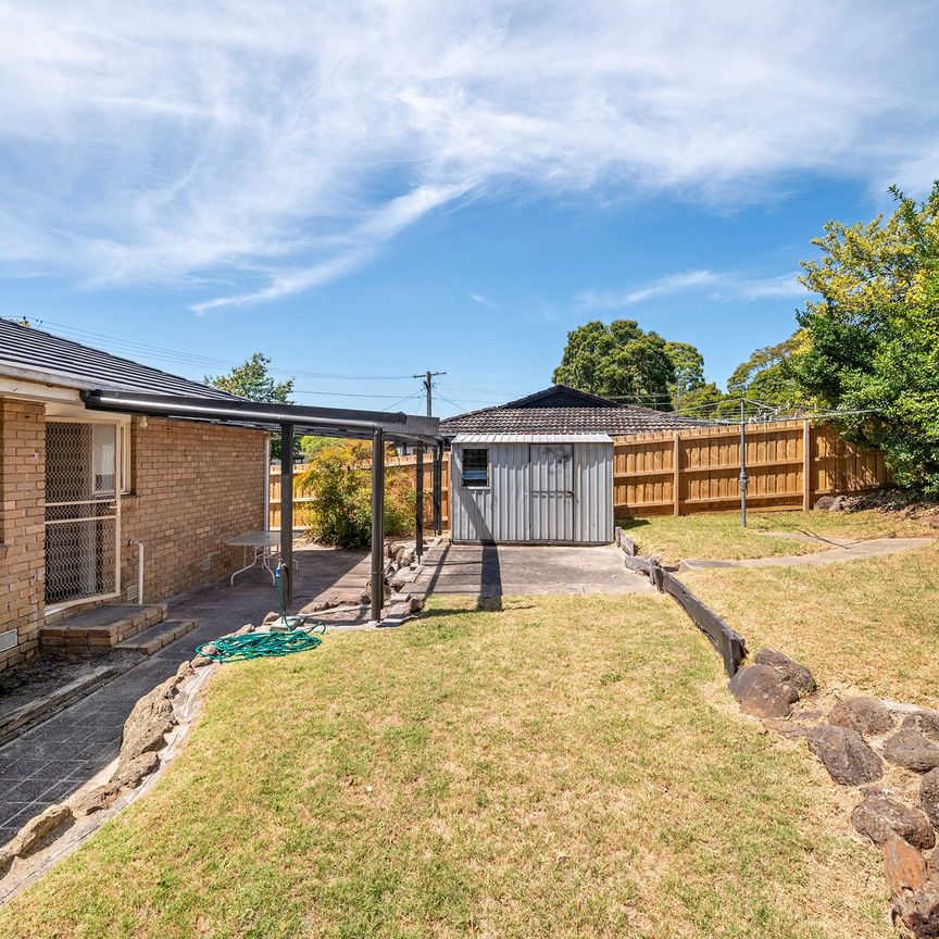 Charming Three-Bedroom Home - Photo 1