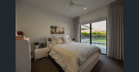 Stylish Four-Bedroom Home With Poolside Living - Photo 4