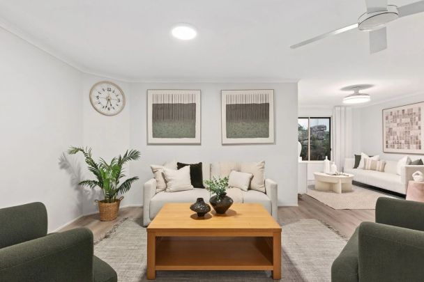 A stylish newly renovated home in one of Wishart's most sought-after pockets, perfectly positioned for families in Mansfield State School Catchment. - Photo 1