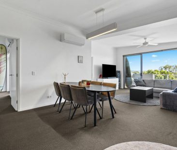 Top Floor Furnished Apartment with Stunning Views & Resort-Style Li... - Photo 3