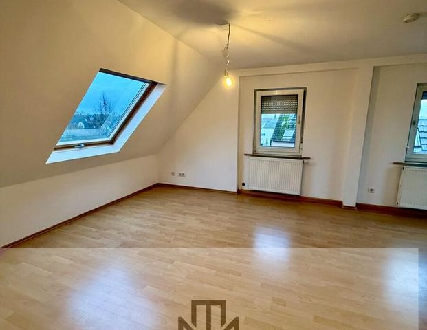 Charmante 47-qm-Dachgeschosswohnung in ruhiger Lage von Nieder-Erlenbach - Photo 1