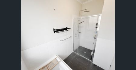 Three bedroom entertainer with two living areas in perfect location! - Photo 4