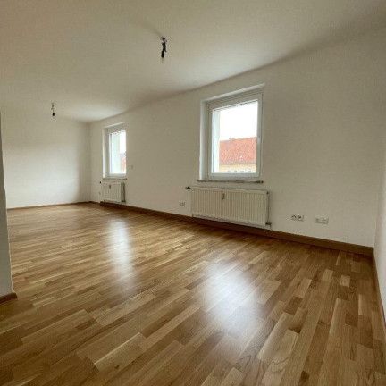 Wohnen zum kleinen Preis! Perfekte Wohnung für junge Familien und Pärchen: Idyllische Grünlage, optimale Infrastruktur, schöne und praktische Raumaufteilung - Photo 1
