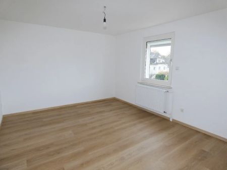 Modernisierte 3-Zimmer-Maisonette-Wohnung im gepflegten Zweifamilienhaus. - Photo 4