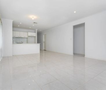 Modern, Low-Maintenance Living in a Prime North Lakes Location - Photo 2