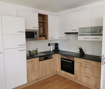 Architektonisch moderne Zweizimmerwohnung mit Caport und PKW-Stellp... - Foto 3