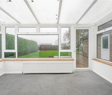 A 3 bedroom bungalow with a large garage and driveway parking in We... - Photo 3