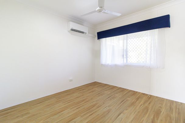 NEAT, TIDY & AIR-CONDITIONED - Photo 1