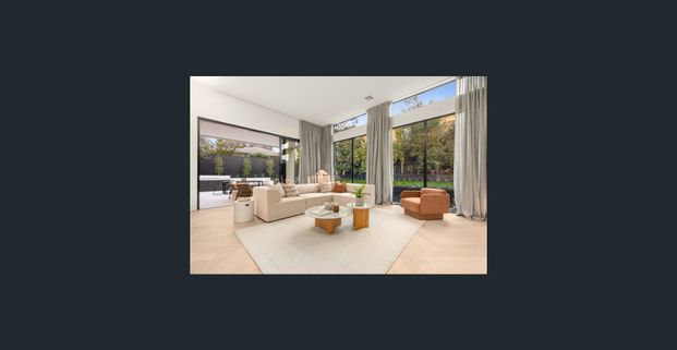 Luxury 5-Bedroom Home with Ensuites & Ample Parking - Photo 1