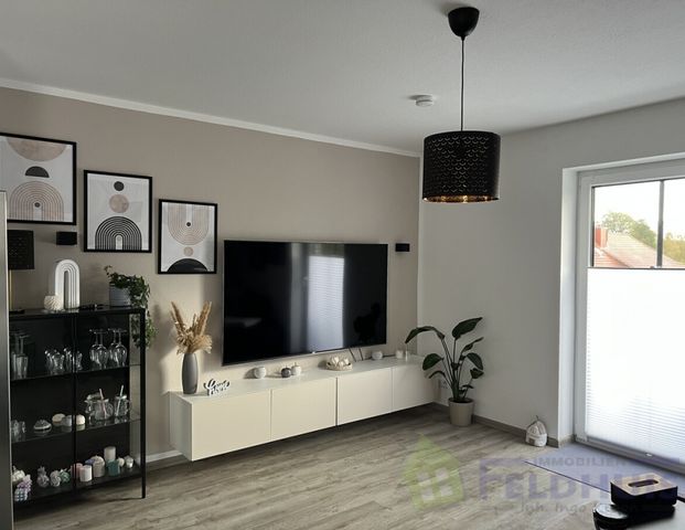 Wohnen in einer gemütlichen und modernen Oberwohnung in Veenhusen! - Foto 1