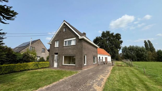 Ruime woning met een grote tuin - Foto 1