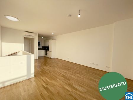 Moderne Dachgeschoss-Maisonette mit Charme und Aussicht - Foto 3