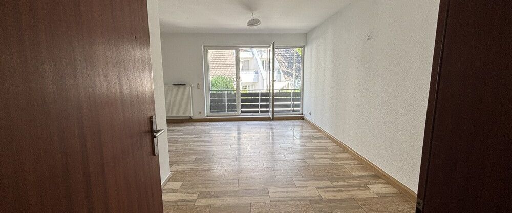 Frisch renovierte 2-Zimmer-Wohnung mit Balkon in grüner und straßenverkehrsberuhigter Wohnlage - Foto 1