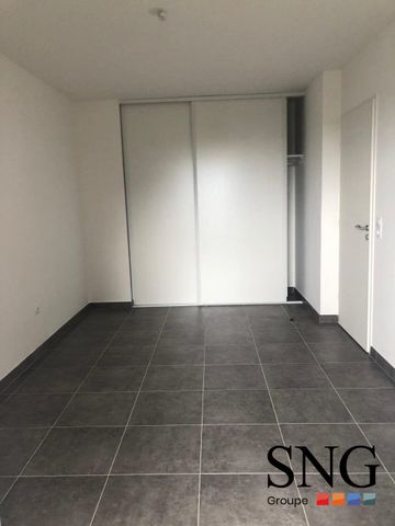 T3 AVEC BALCON ET PARKING EXTERIEUR - Photo 2