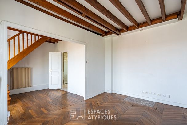 Duplex atypique en dernier étage - Photo 1