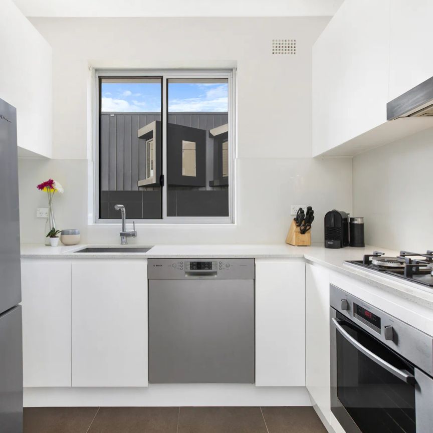 Sunbathed Top Floor Apartment In Paramount Position- Garage plus Car Space - Photo 1