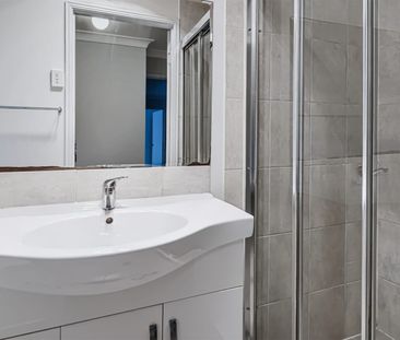 Back Property - Spacious Family Living with Solar, Water Tanks & Mo... - Photo 4
