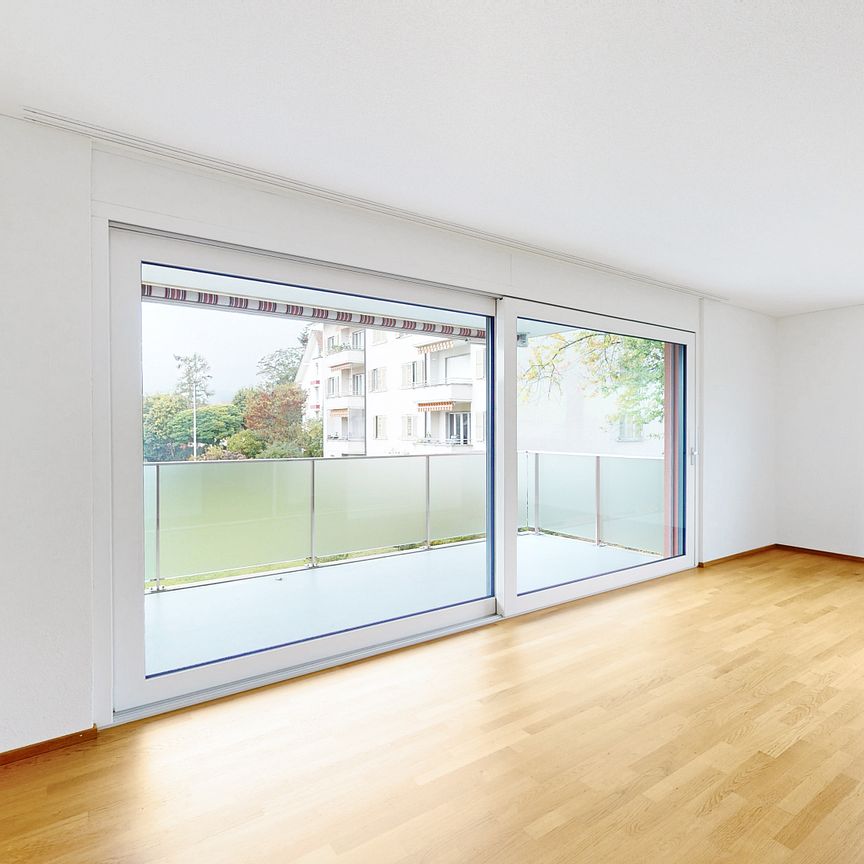 Moderne Wohnung in ruhigem Wohnquartier mit Waldnähe - Foto 1