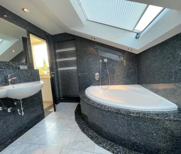 Exklusive Dachgeschosswohnung in ruhiger Lage - Photo 6