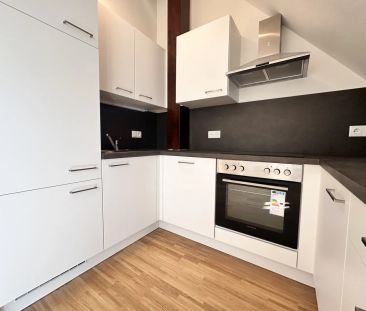 TOP Sanierte Wohnung im Dachgeschoss - Mit Schlossbergaussicht - Foto 6