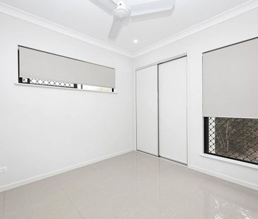 Modern Four-Bedroom Family Home in Prime Location - Photo 2