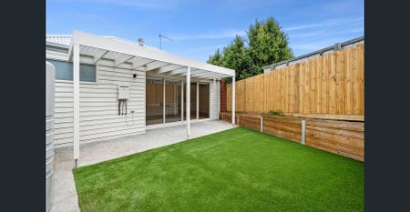 Modern Two-Bedroom Home in a Convenient Location - Photo 3