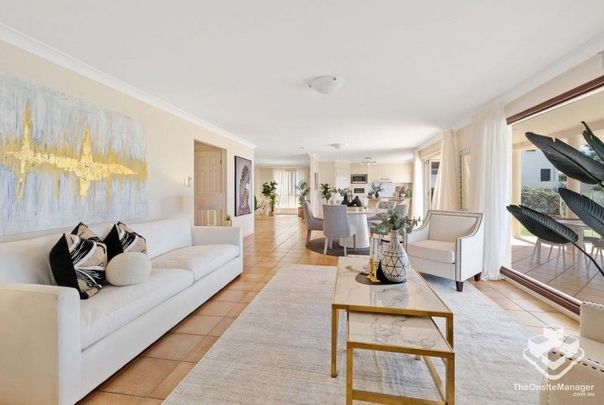 Stunning Canal-Front Home with Pontoon â Convenience Meets Lifestyle - Photo 1