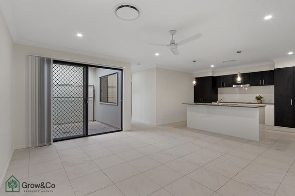 NEAR NEW 3BED HOME WITH DUCTED AIR-CON - Photo 1