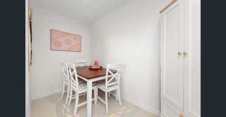 RENOVATED INNER-CITY RETREAT WITH BALCONY & LOCK-UP GARAGE - Photo 3