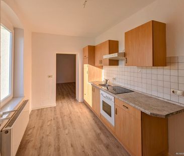 Gemütliche Erdgeschosswohnung mit Einbauküche - Photo 3