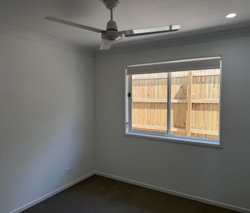 Spacious 4-Bedroom, 2-Bathroom House - Photo 1