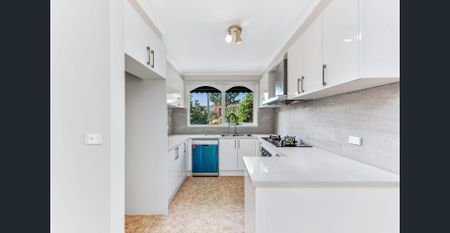 Charming Renovated Unit! - Photo 2