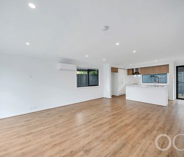 Open the Door to Modern Comfort and Easy Living in Woodville Gardens - Photo 6